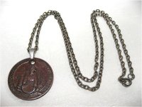 男性と馬車のメダルネックレス(ヴィンテージ)